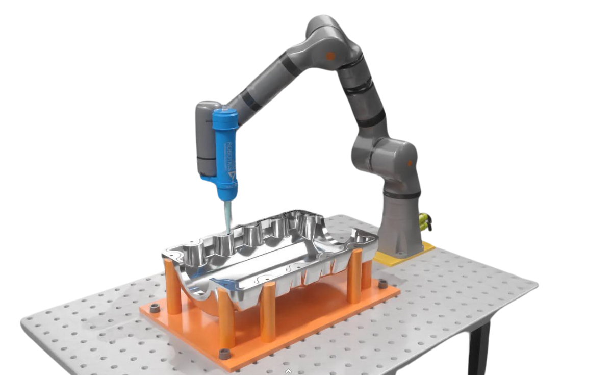 A generic robot dispensing cell for an automotive part.